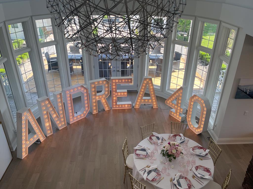 Oshawa marquee letters and numbers that spell a name and show an age