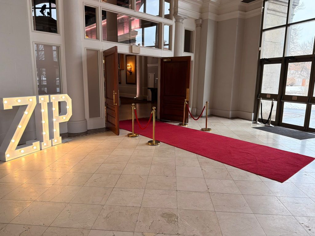 Red carpet rental with marquee letters and stanchions