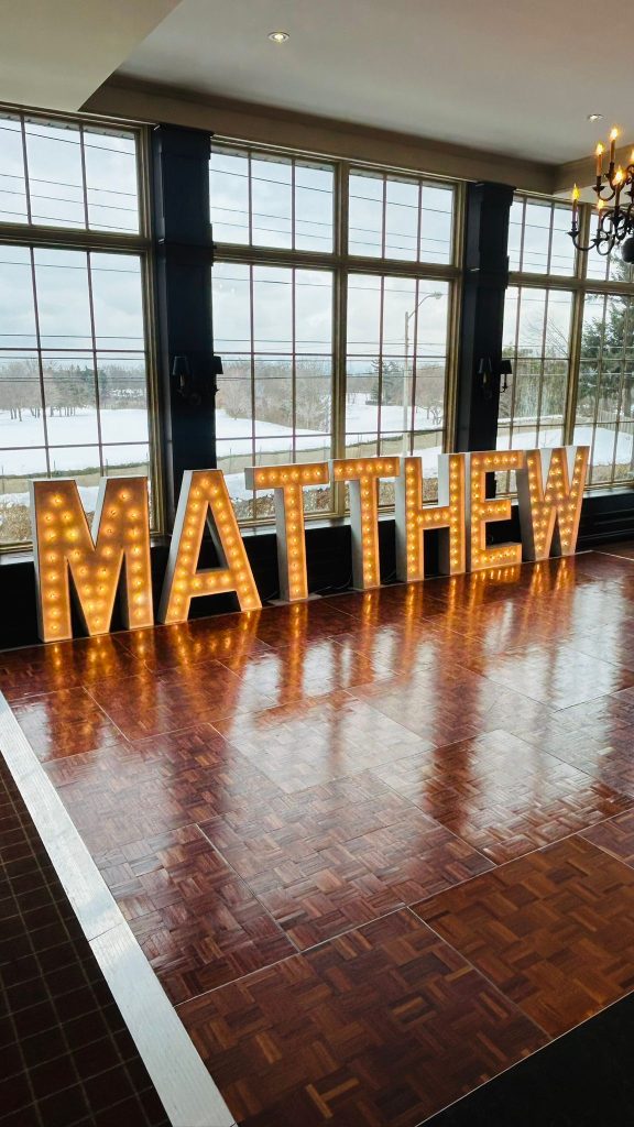 Marquee letters in Cambridge that spell out a name