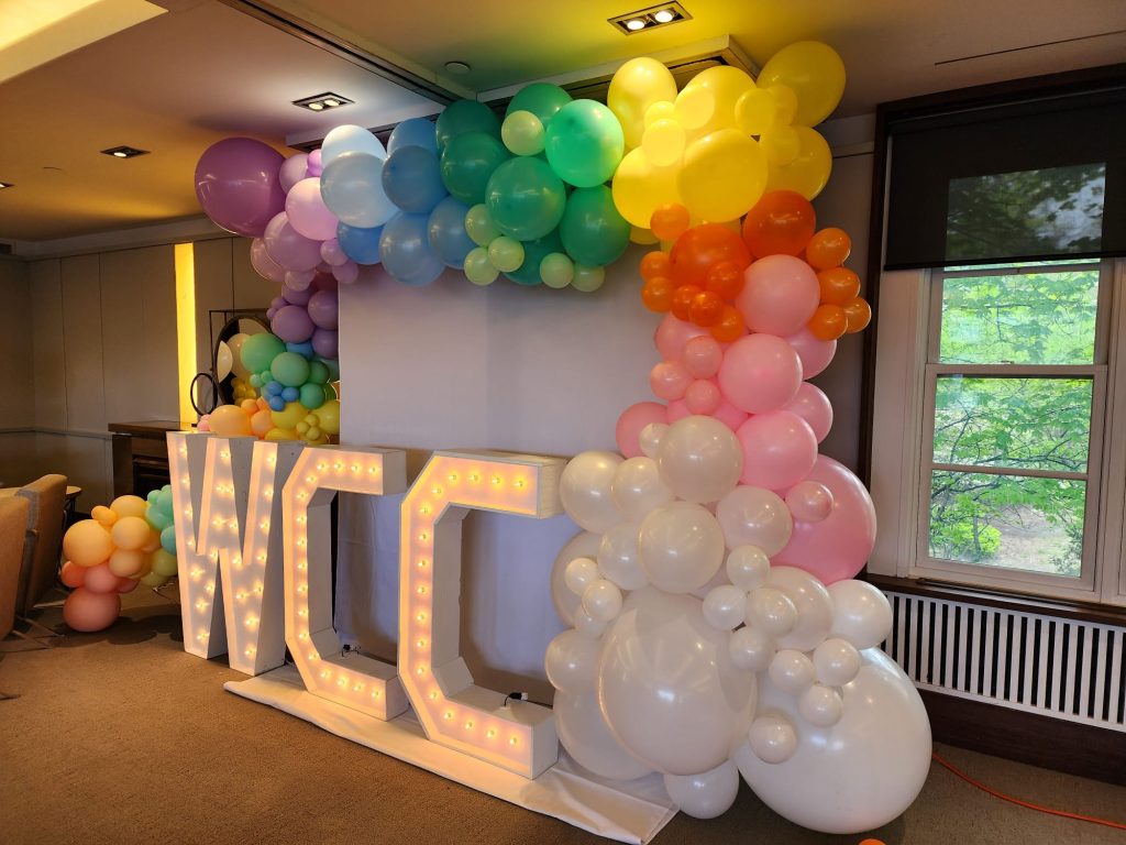 Rent Hamilton marquee letters with a backdrop and balloon decor