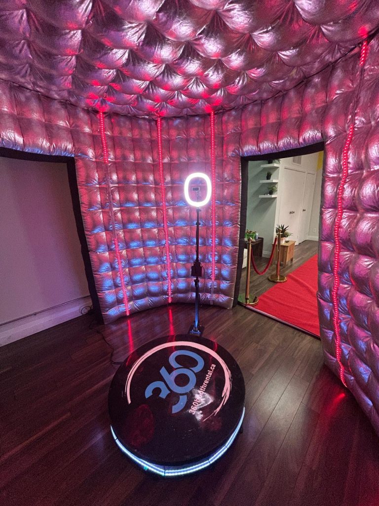 Enclosed 360 video booth in mississauga with red carpet and stanchions