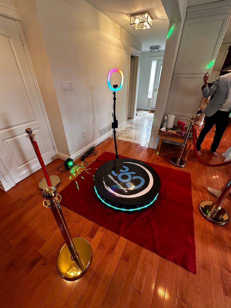 Toronto 360 video booth with a red carpet and stanchions
