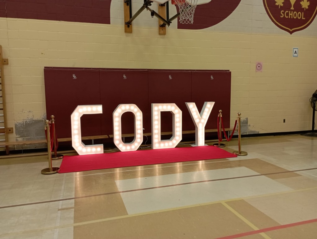 Marquee letters in toronto with a red carpet rental and stanchions.