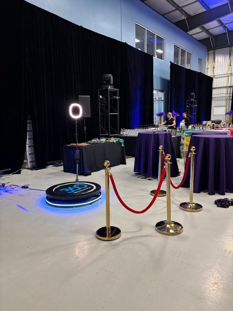 Cambridge 360 video booth with stanchions and props for celebrations
